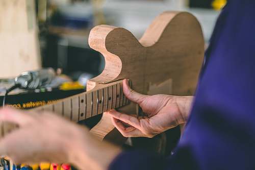 leisure activities brown wooden guitar shape decor musical instrument